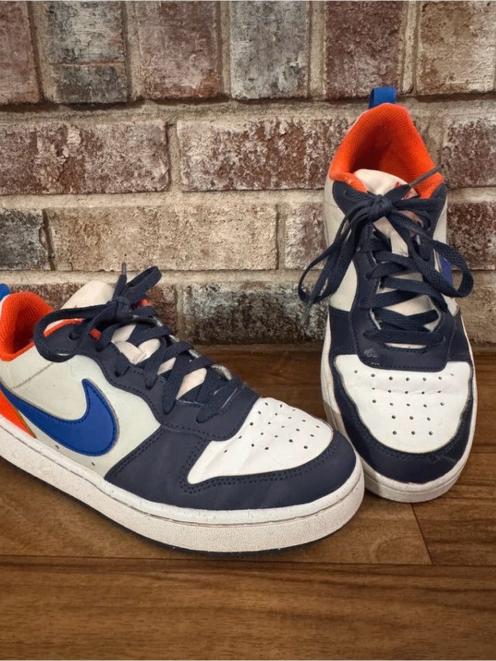 Nike Kids White, Navy & Bright Blue Low-Top Sneakers with Orange Lining